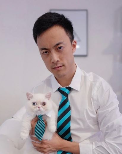 Edison Park with his pet cat