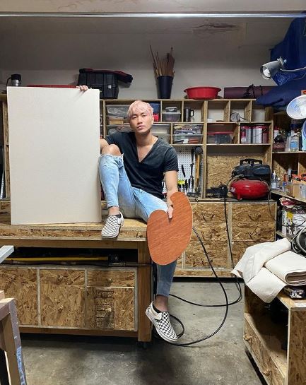 Frances Amor in his shop