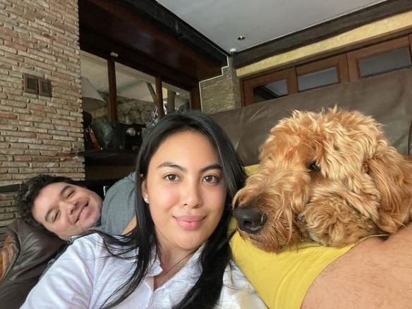 Hearn with his fiancée Dominique Cojuangco and pet dog Chapo