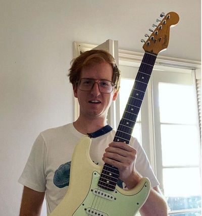 James Austin Johnson loves to play guitar