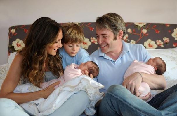 James's old photo with his parents and younger sisters