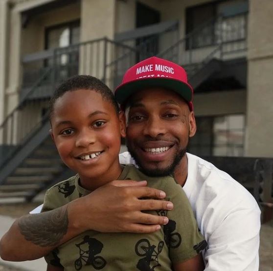 Loza Alexander with his son