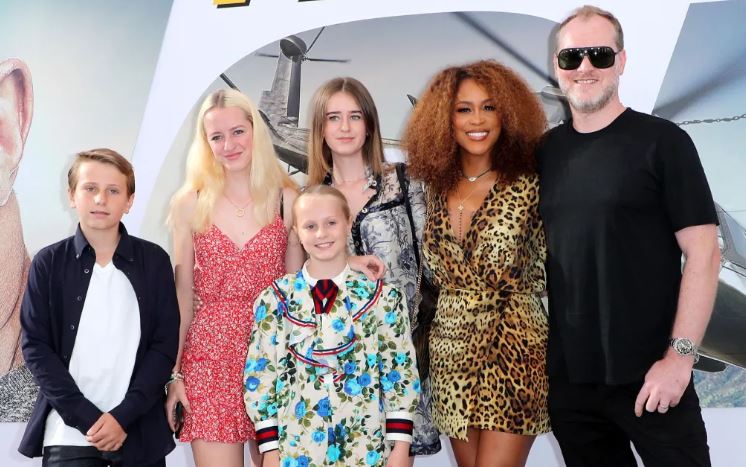 Maximillion Cooper with his children and wife Eve
