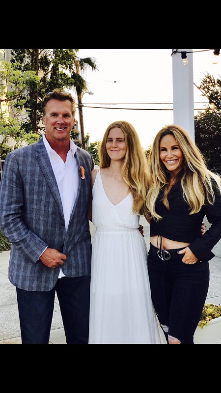 Raine Finley with her mother and Father
