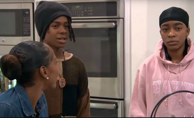 Robert Kelly Jr. with his mother Andrea Kelly and brother Jay Kelly