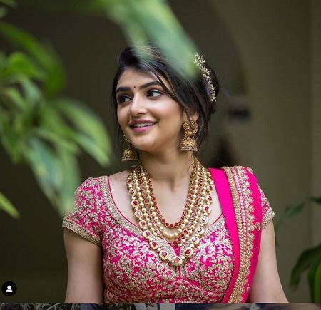 Sreeleela wearing lehnga and jewellery
