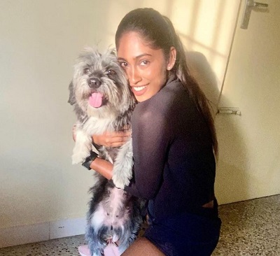 Suruthi Periyasamy with her pet dog