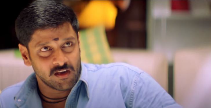 The lead role of Arumugam is played by Vikram