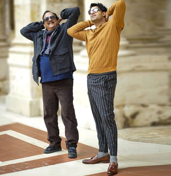 Actors Prabhas and Krishnam Raju on the set of Radhe Shyam