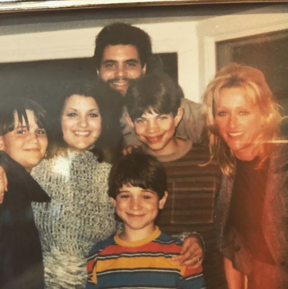 An old photo of Joey with his family member