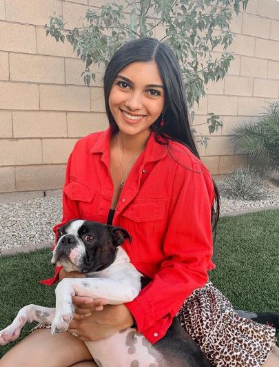 Brenna Marie Narayan with her pet dog Taco