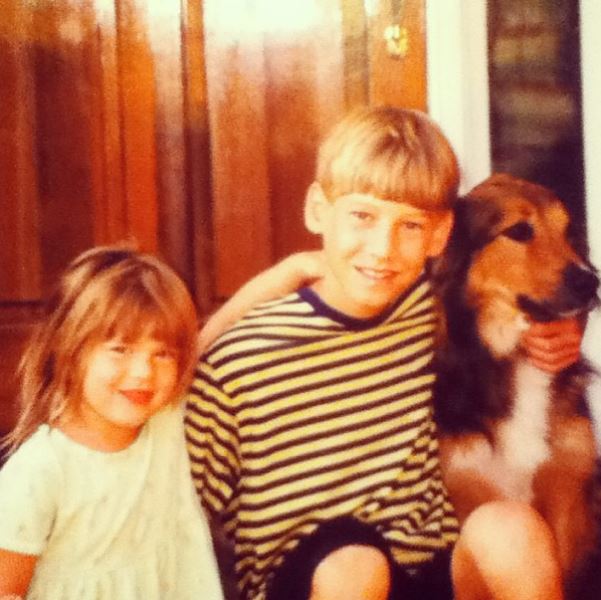 Childhood photo of Austen with his sibling and dog