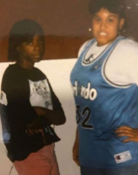 Childhood photo of Latasha Kebe with her friend