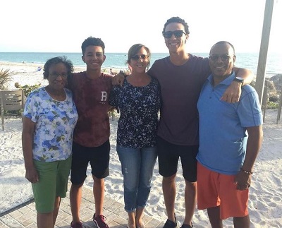 Cole Tucker with his mother Erin Tucker, father Jackie Tucker and brother Carson Tucker