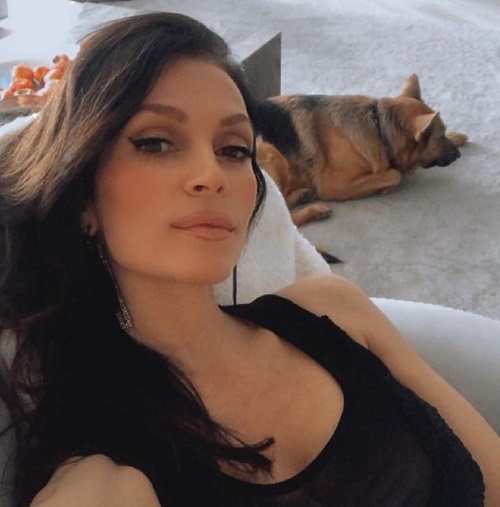 Denise Milani has a pet dog named Luke