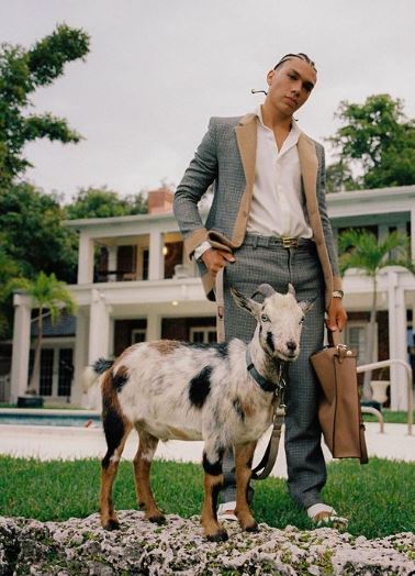 Elias Becker with his pet goat