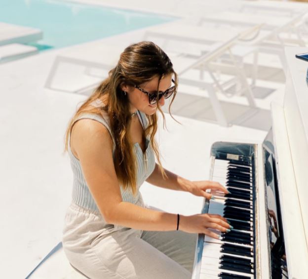 Gwen Harrison loves to play Piano