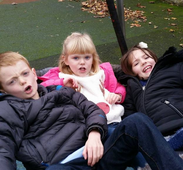 Henry 's childhood photo with his sisters