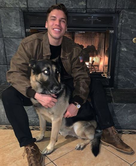 Joseph with his pet dog