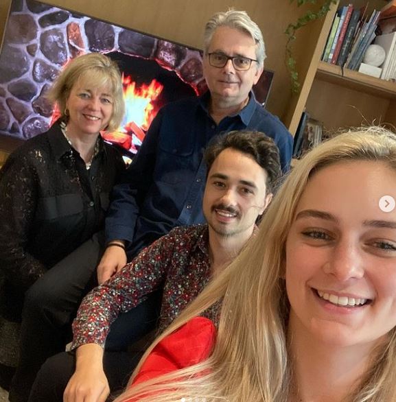 Lucy Currey with her father mother and brother