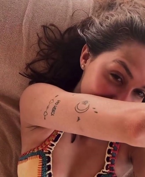 Luisa Rubino has multiple tattoos