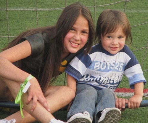 Luisa Rubino was photographed with her brother