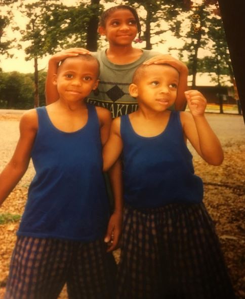 Old image of Dana Isaiah with his siblings