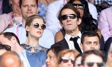 Robie Uniacke with his wife Rosamund Pike