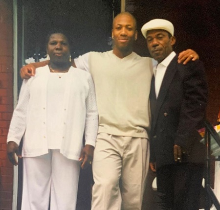 Shawn Rhoden with his mother and father