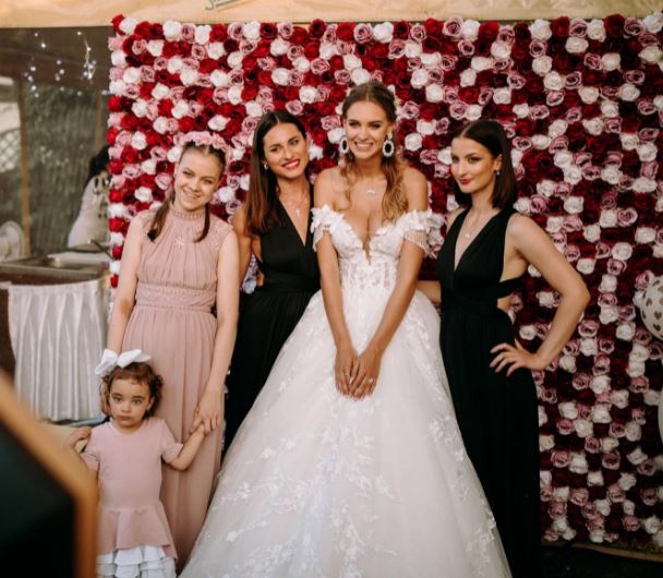 Veronika Rajek with her siblings