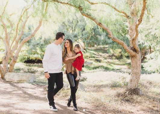 Angel with her family