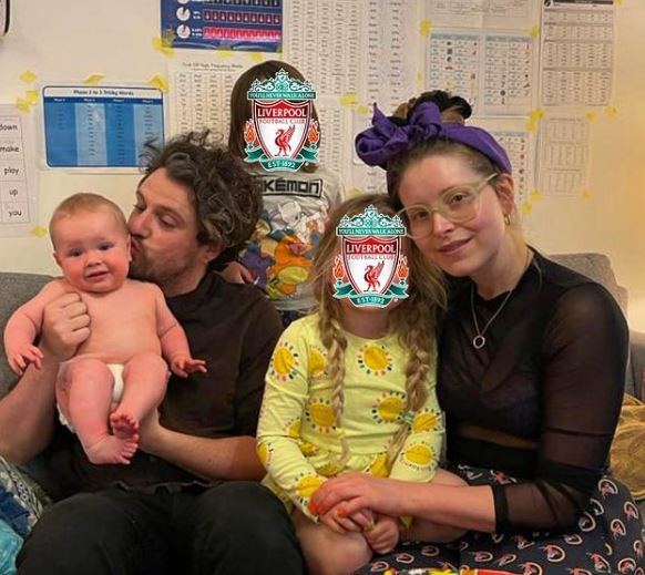 Brown with his wife Jessie Cave and kids