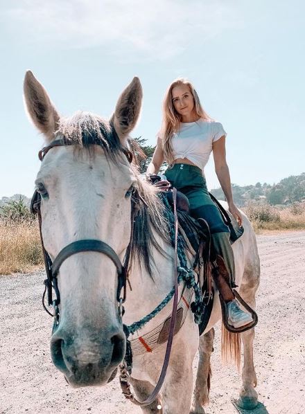 Caroline loves horse riding