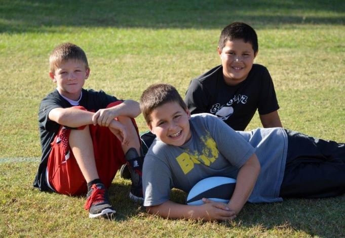 Childhood photo of Lavatai with his siblings