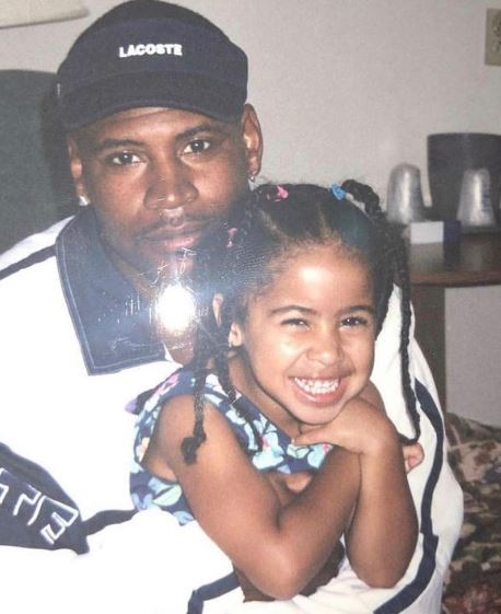 Childhood photo of Yasmine with her father