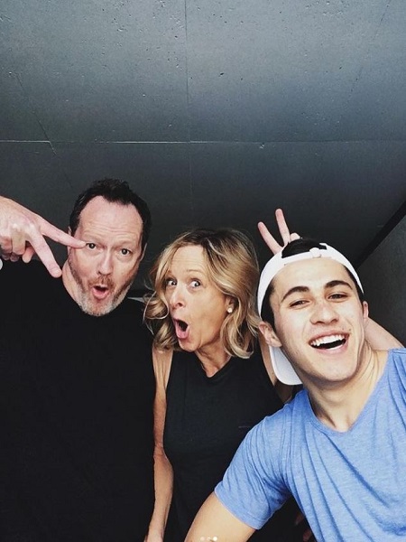 Chri Olsen with her father and step mother