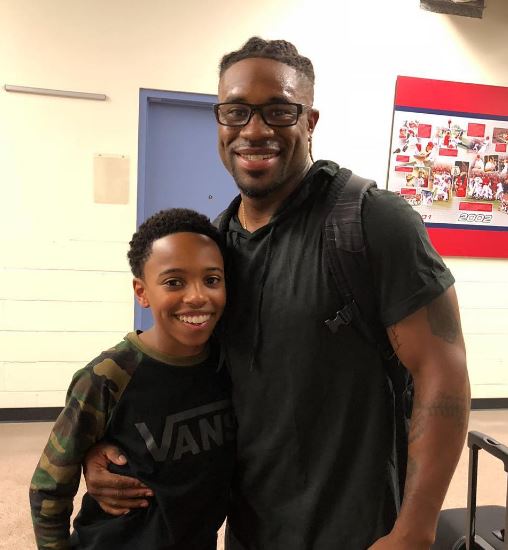 Dallas with his brother Eric Young Jr