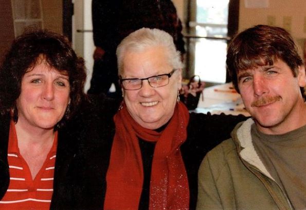 Jeff Dabe with his mother and family member