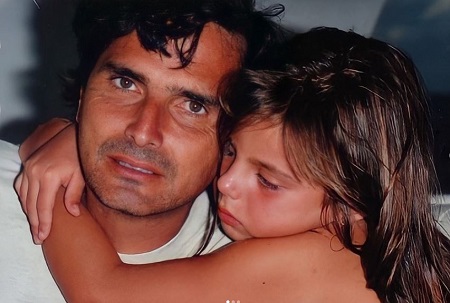 Kelly childhood picture with her father