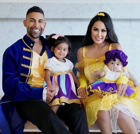 Laura G with husband and two daughters