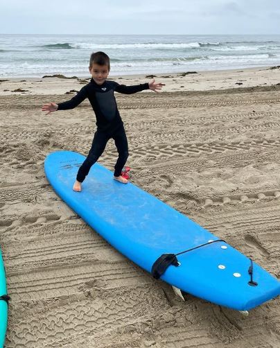 Reign Disick learned surfing