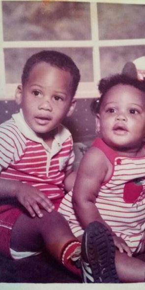 The childhood image of Erica Dixon with her elder brother
