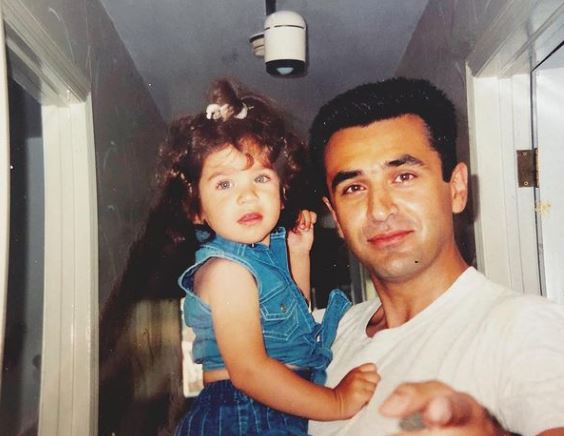 The childhood image of Isabel Pakzad with her dad
