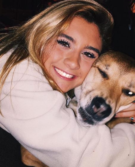 Woynilko with her pet dog