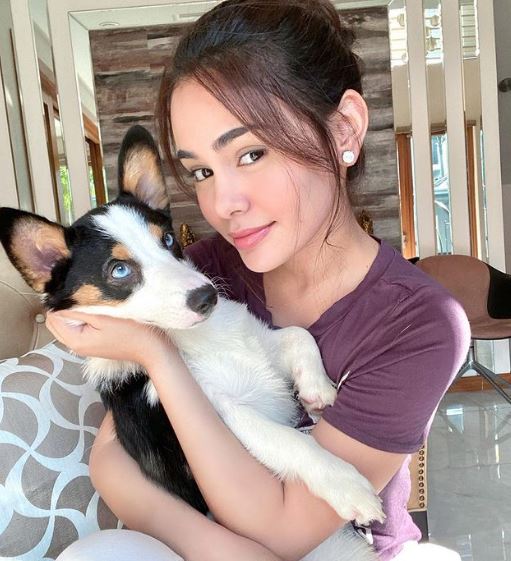 Alawi with her pet dog