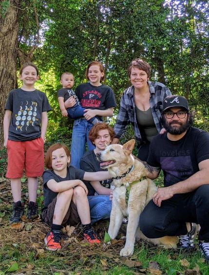 Albert with his wife and 5 children