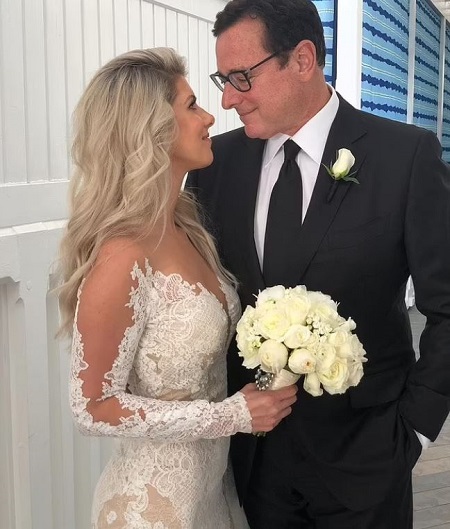 Aubrey Saget father with her step mother