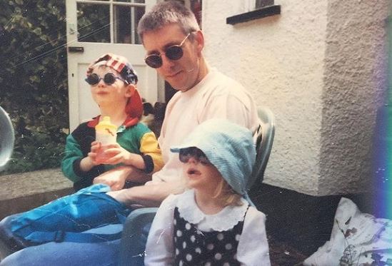 Childhood photo Lydia Fleming with her dad and sibling