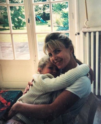 Childhood photo of Julie with her mother