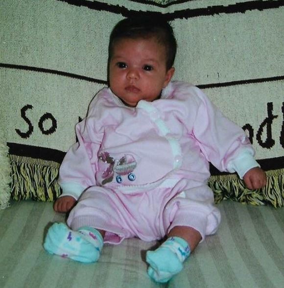 Childhood photo of Rebecca Louise